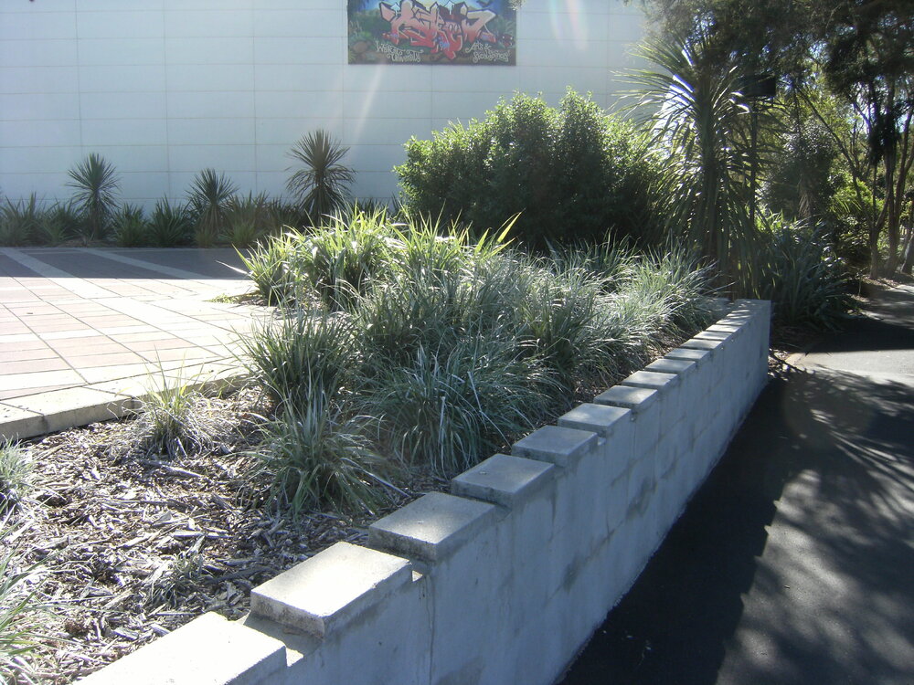 Brick wall outside Gallagher Academy of Performing Arts