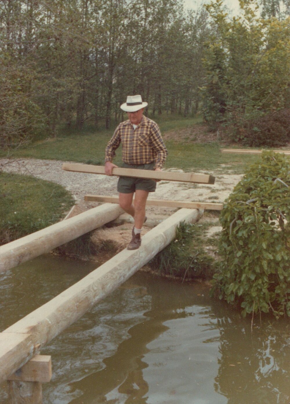 Grounds staff building bridge