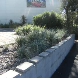 Brick wall outside Gallagher Academy of Performing Arts