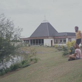 Students resting near Lady Goodfellow Chapel