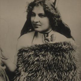 Māori Woman wearing a cloak of Kiwi feathers